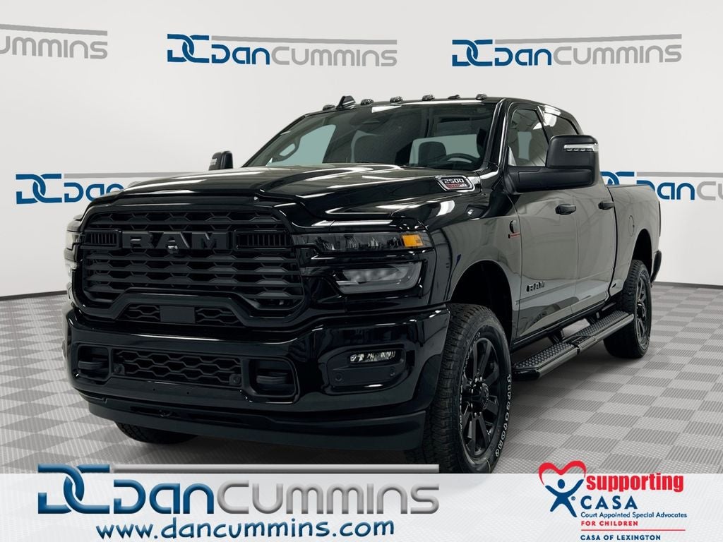 2026 RAM 2500 Big Horn in Diamond Black Crystal Pearl-Coat Exterior Paint — front three-quarter view