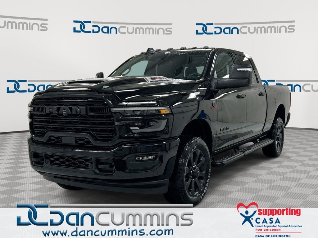 2026 RAM 2500 Laramie in Diamond Black Crystal Pearl-Coat Exterior Paint — front three-quarter view