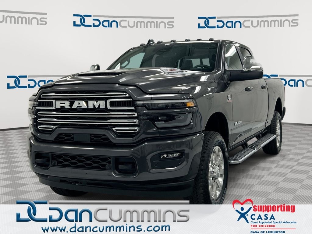 2026 RAM 2500 Laramie in Granite Crystal Metallic Clear-Coat Exterior Paint — front three-quarter view