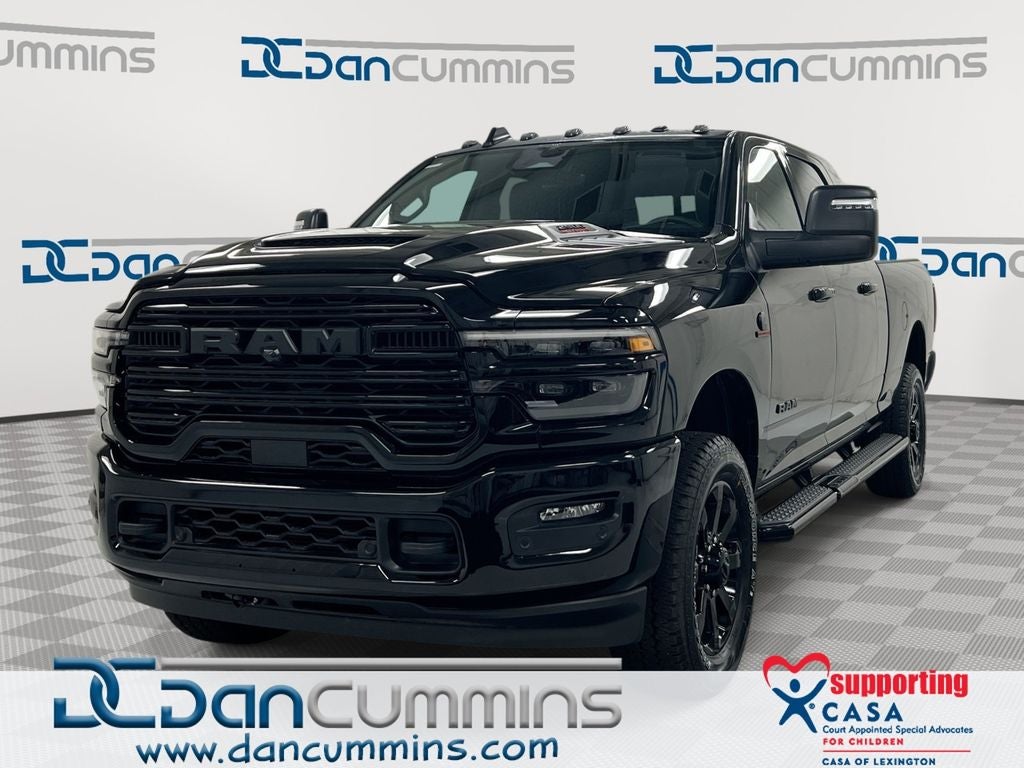 2026 RAM 2500 Laramie in Diamond Black Crystal Pearl-Coat Exterior Paint — front three-quarter view