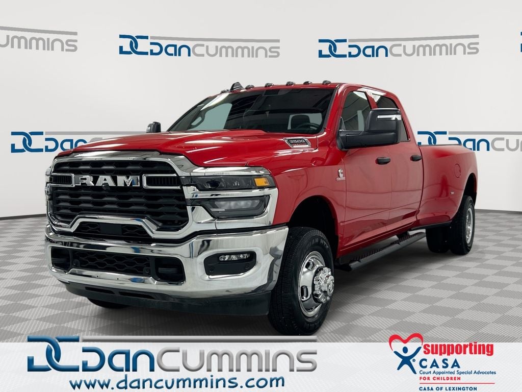 2026 RAM 3500 Tradesman in Flame Red Clear-Coat Exterior Paint — front three-quarter view