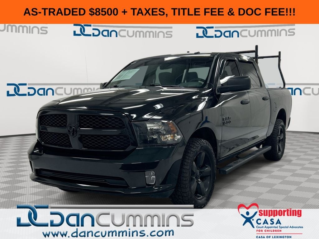 2016 RAM 1500 Express in Brilliant Black Crystal Pearlcoat — front three-quarter view