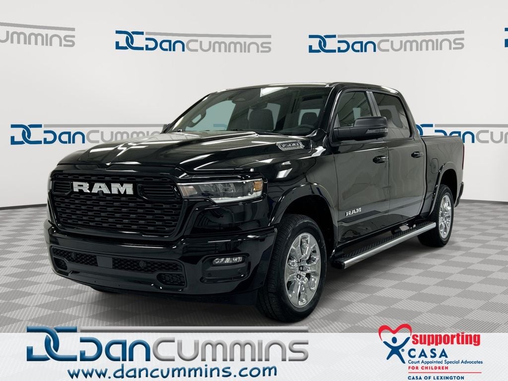 2026 RAM 1500 Big Horn/Lone Star in Diamond Black Crystal Pearl-Coat Exterior Paint — front three-quarter view
