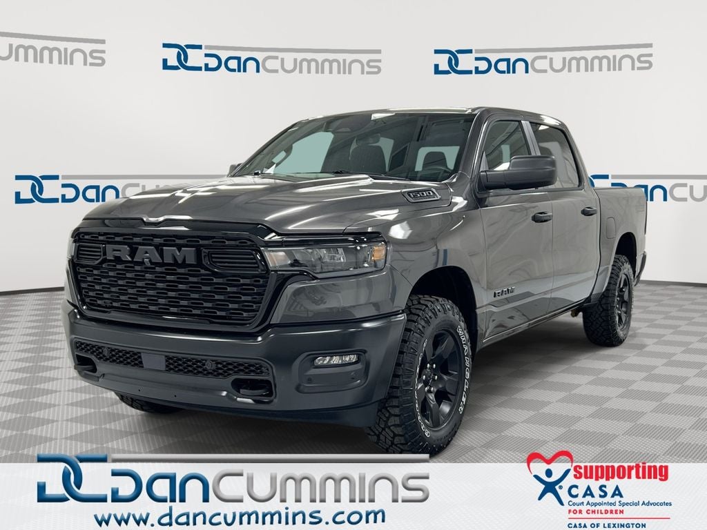 2026 RAM 1500 Warlock in Granite Crystal Metallic Clear-Coat Exterior Paint — front three-quarter view