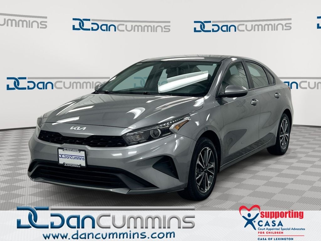 2024 Kia Forte LXS in Steel Gray — front three-quarter view