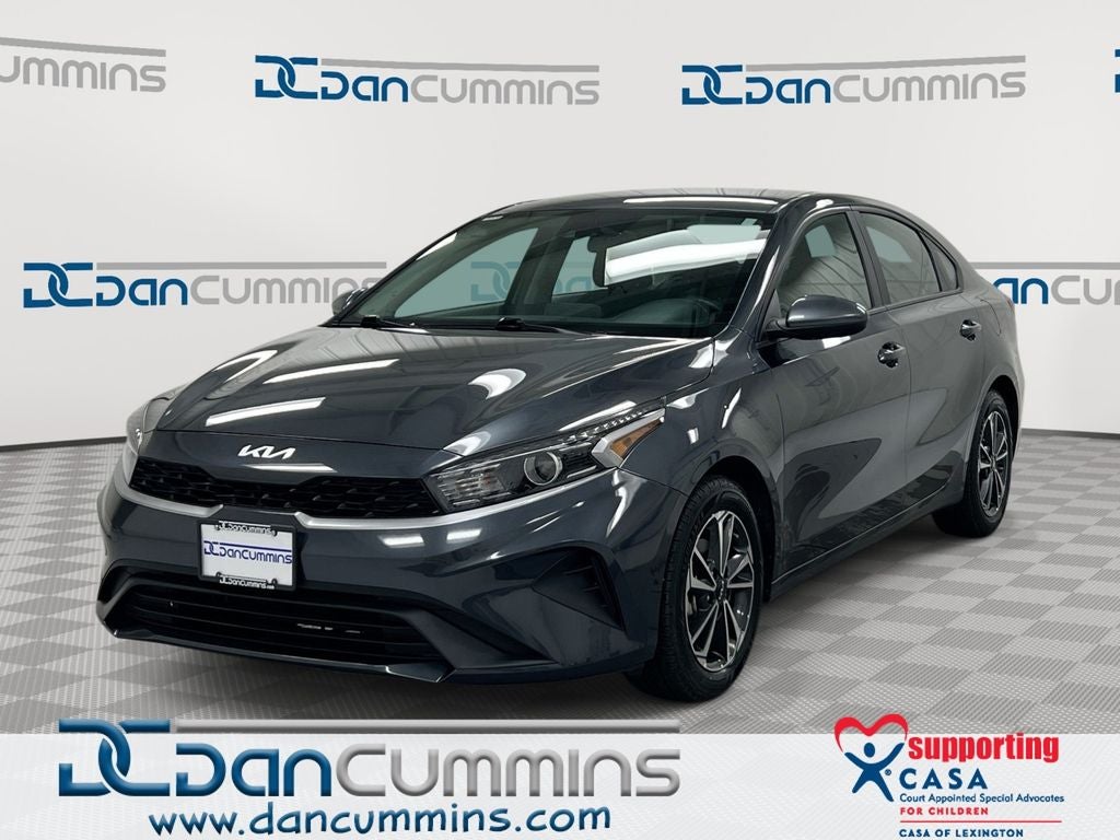 2024 Kia Forte LXS in Gravity Gray — front three-quarter view