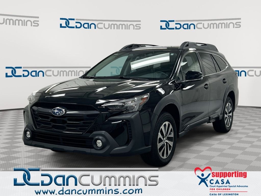 2023 Subaru Outback Premium in Crystal Black Silica — front three-quarter view