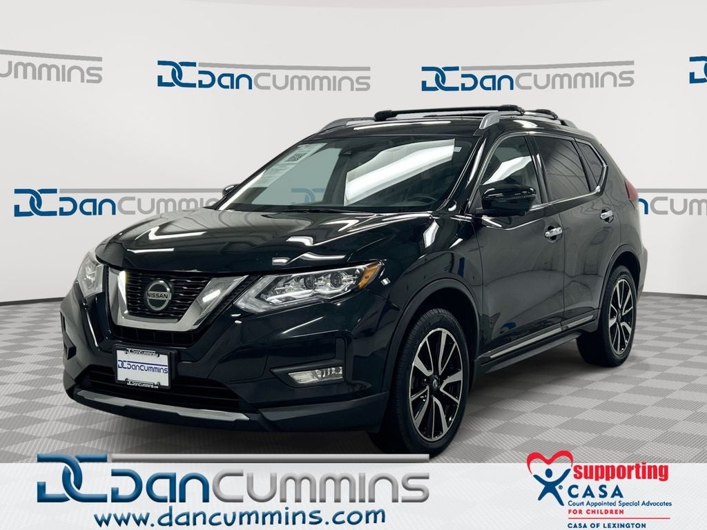 2019 Nissan Rogue SL in Magnetic Black Pearl — front three-quarter view