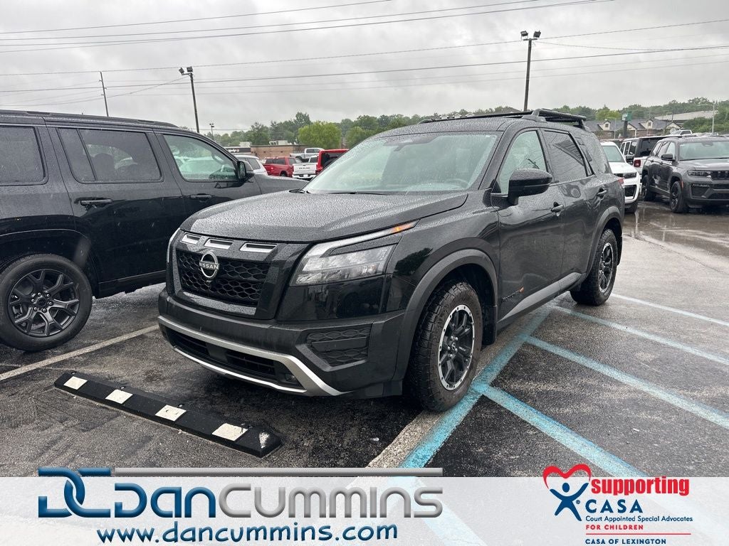 2025 Nissan Pathfinder Rock Creek in Super Black — front three-quarter view