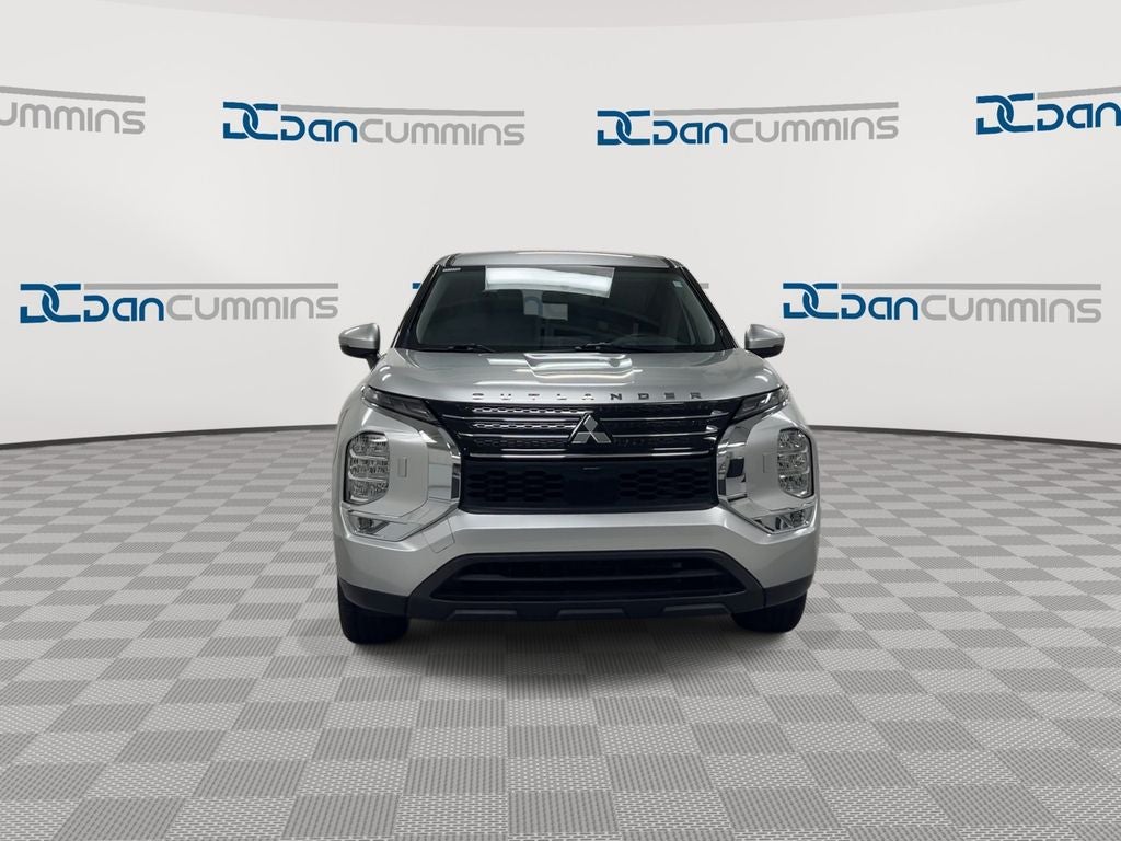 2024 Mitsubishi Outlander — rear three-quarter view