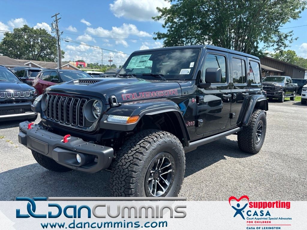 2026 Jeep Wrangler Rubicon X in Black Clear-Coat Exterior Paint — front three-quarter view