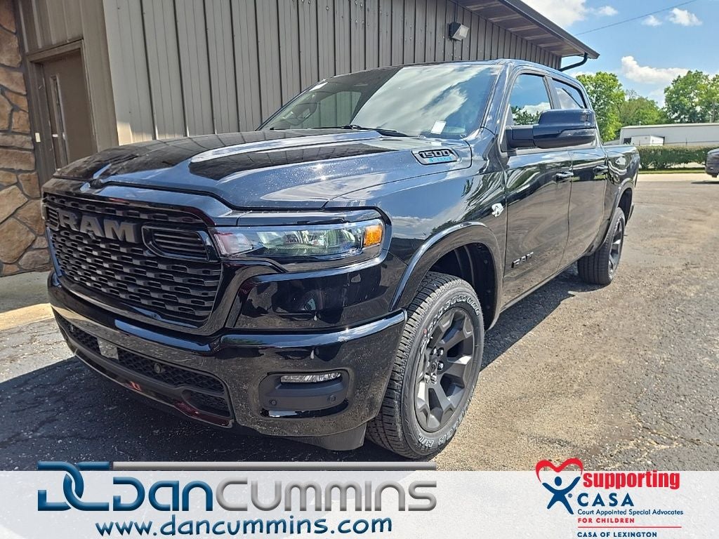 2026 RAM 1500 Big Horn/Lone Star in Diamond Black Crystal Pearl-Coat Exterior Paint — front three-quarter view