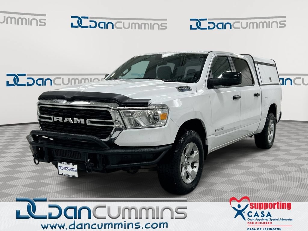 2023 RAM 1500 Big Horn in White — front three-quarter view