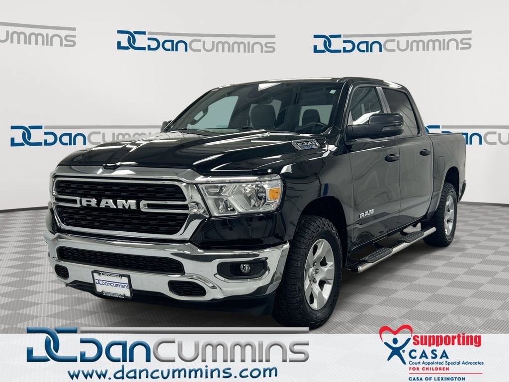 2023 RAM 1500 Big Horn in Black — front three-quarter view