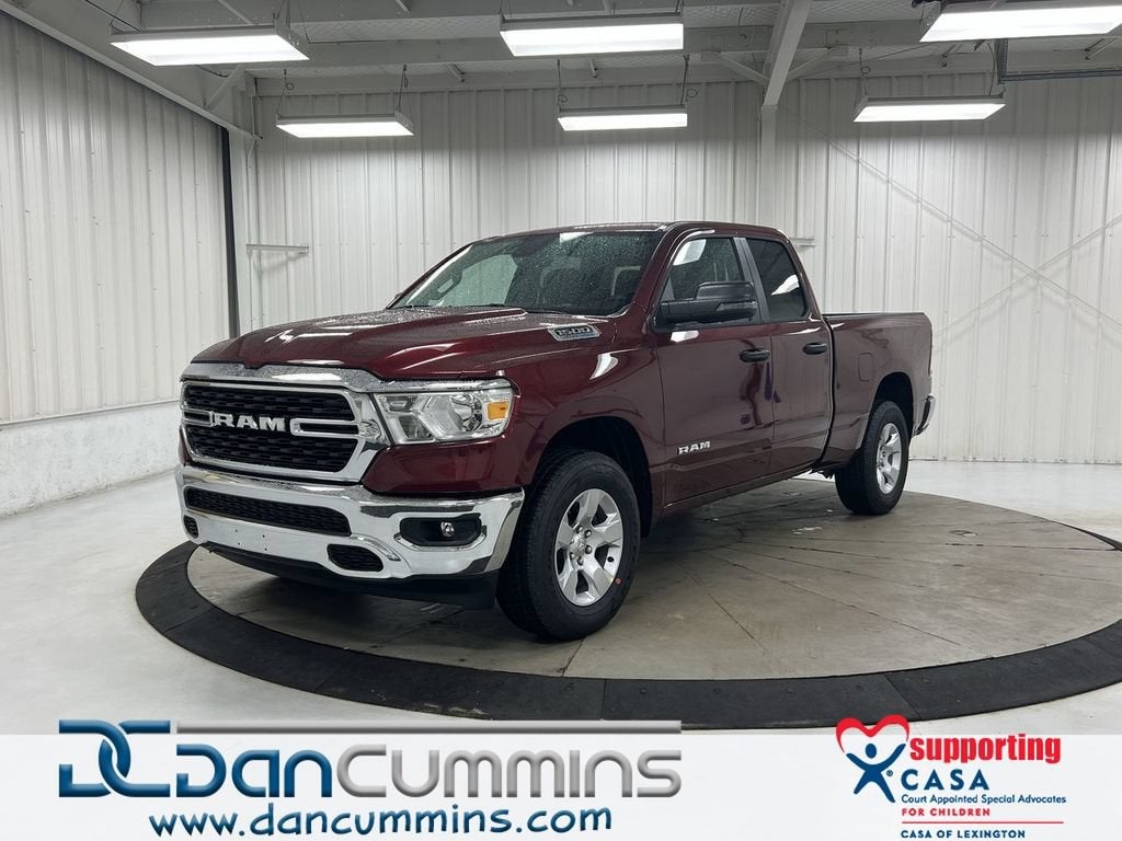 2023 RAM 1500 Big Horn in Red — front three-quarter view