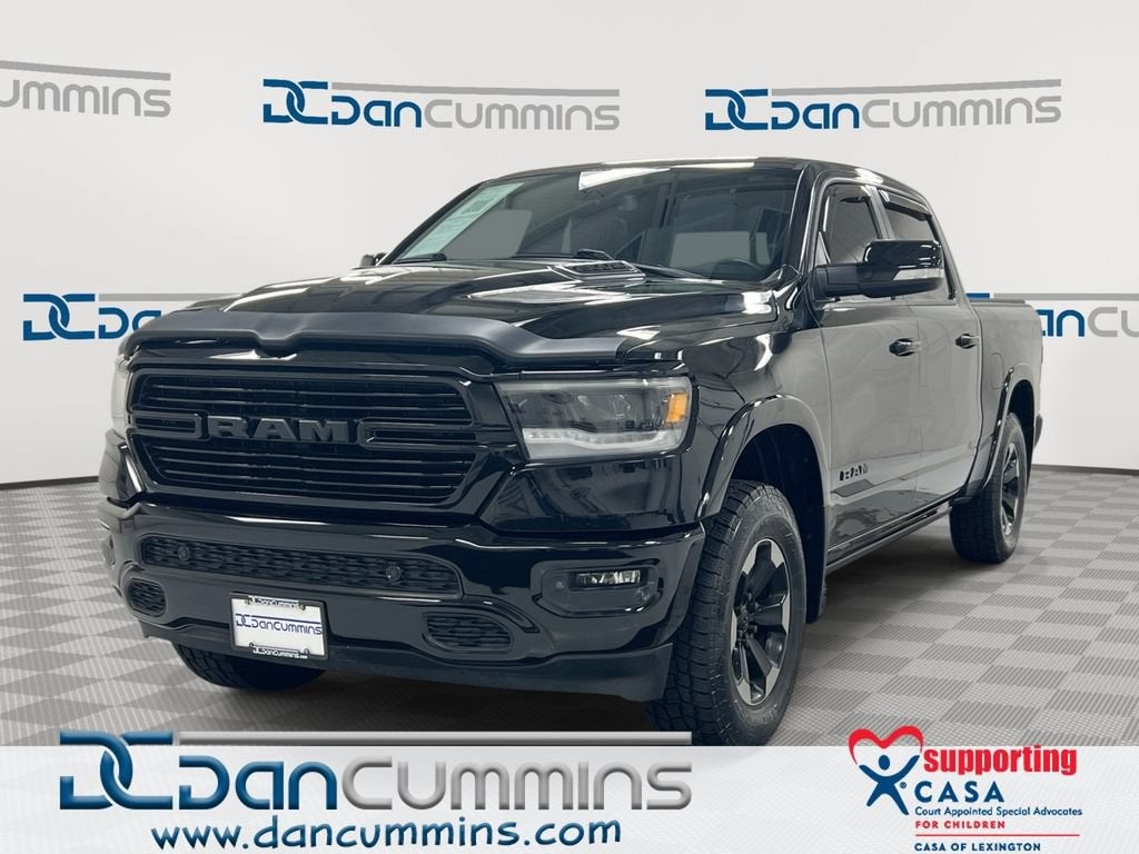 2019 RAM 1500 Laramie in Black — front three-quarter view