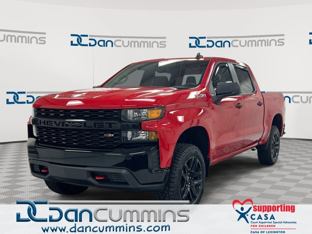 2021 Chevrolet Silverado 1500 Custom Trail Boss in Red Hot — front three-quarter view