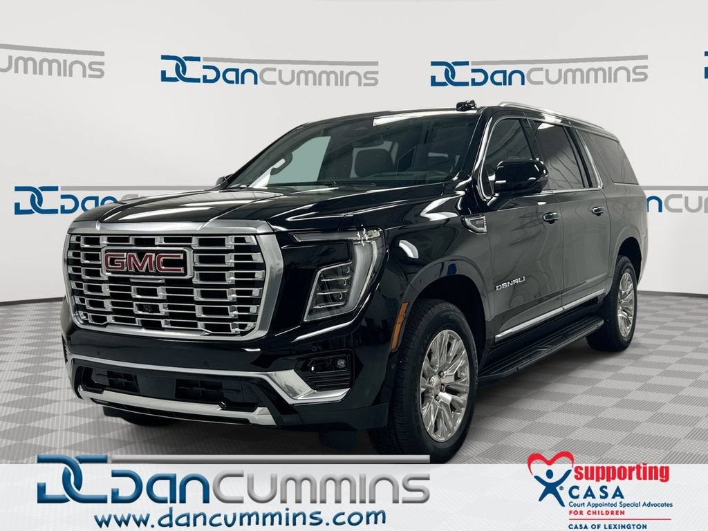 2025 GMC Yukon XL Denali in Onyx Black — front three-quarter view