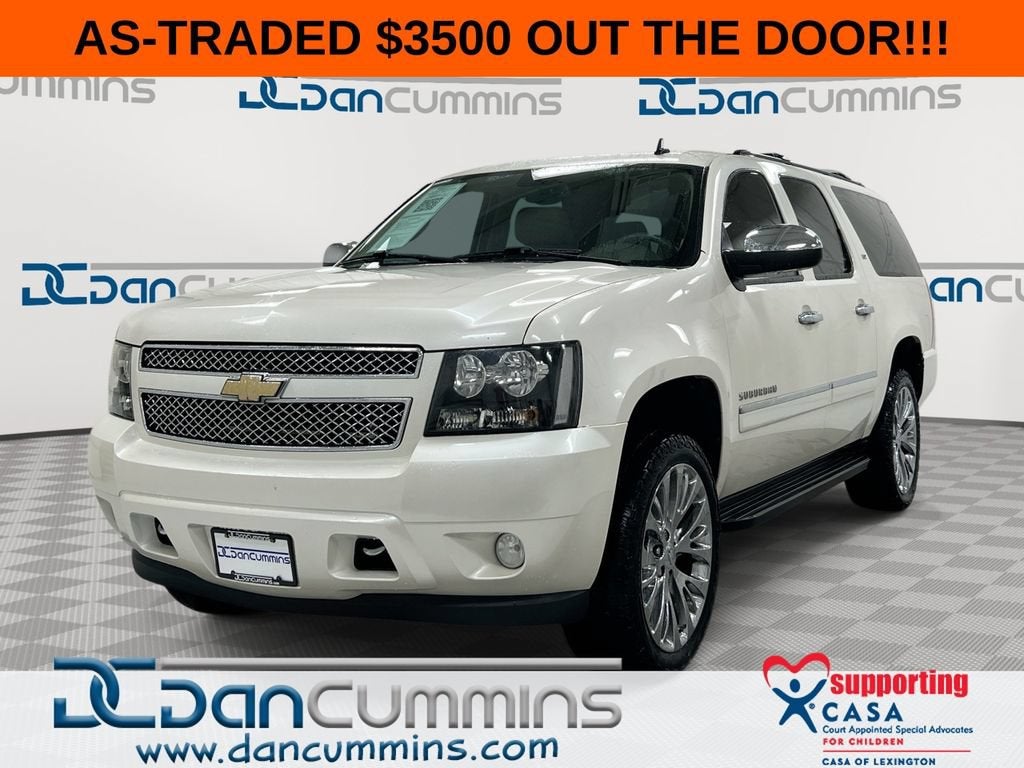 2011 Chevrolet Suburban LTZ in White Diamond Tricoat — front three-quarter view