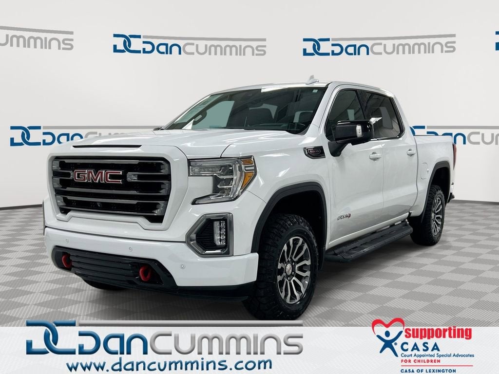 2020 GMC Sierra 1500 AT4 in Summit White — front three-quarter view