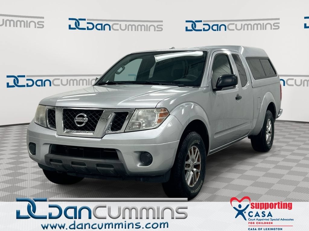 2016 Nissan Frontier SV in Silver — front three-quarter view