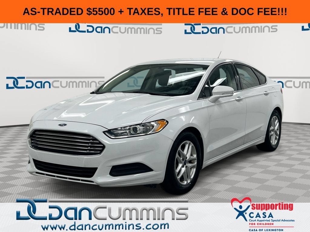 2014 Ford Fusion SE in White — front three-quarter view