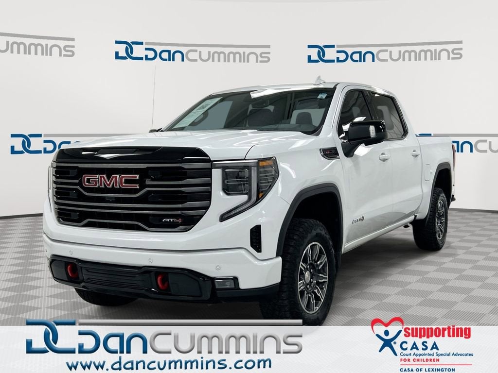 2025 GMC Sierra 1500 AT4 in Summit White — front three-quarter view