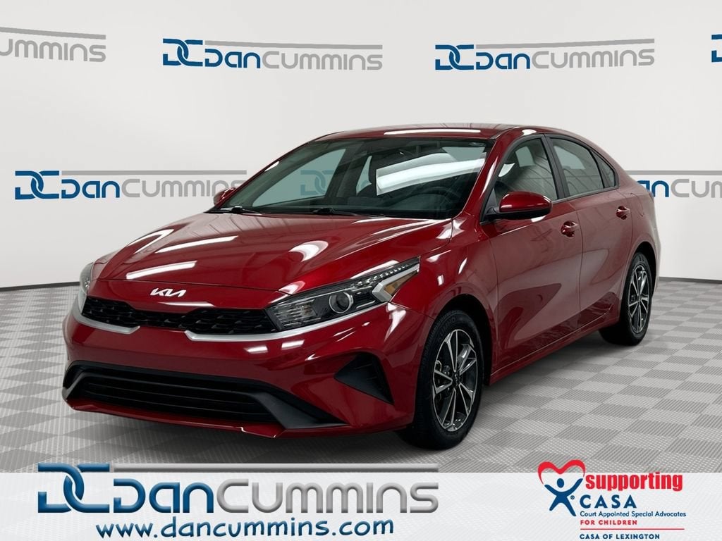 2024 Kia Forte LXS in Red — front three-quarter view
