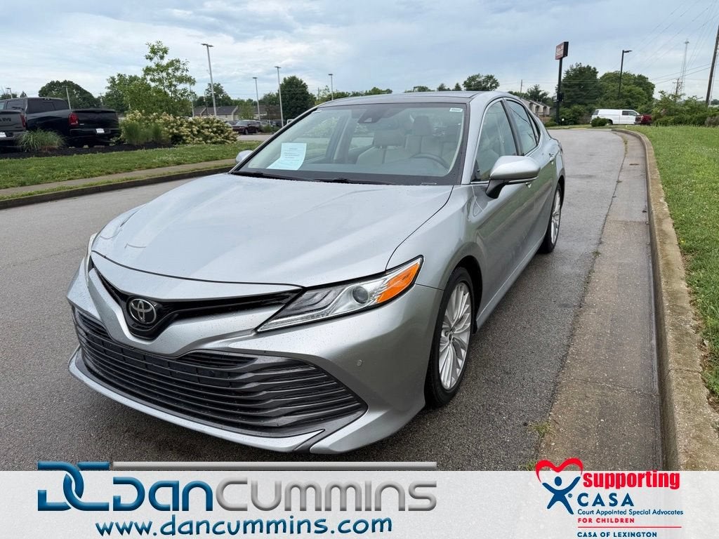 2018 Toyota Camry LE in Gray — front three-quarter view