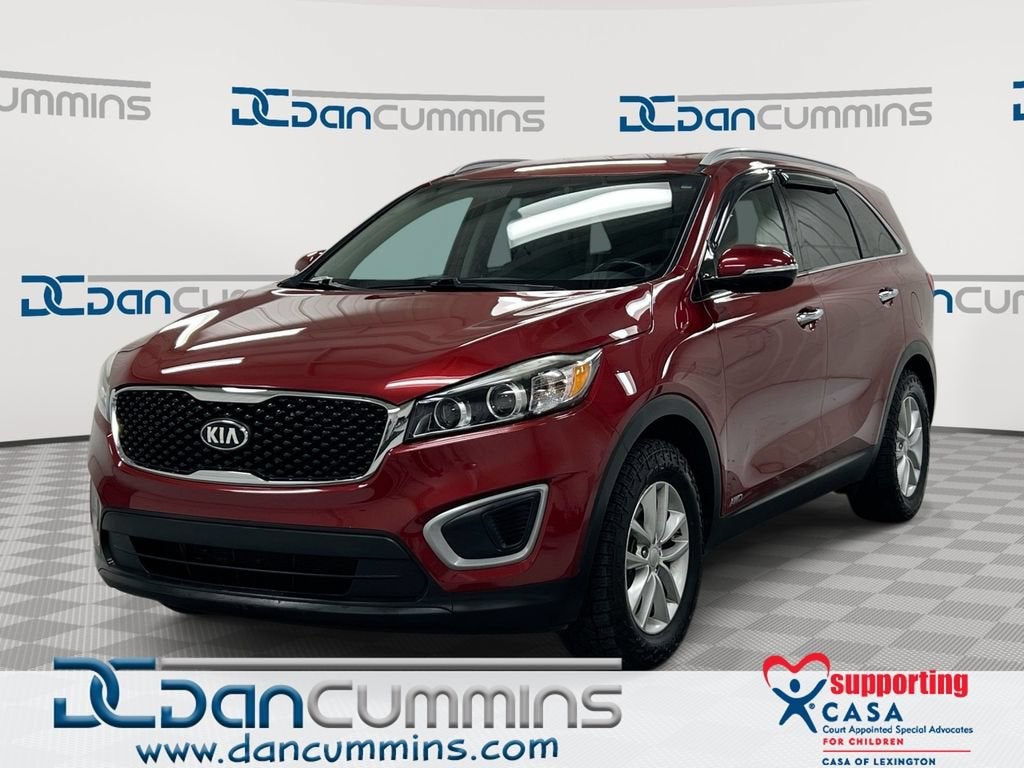 2017 Kia Sorento LX in Red — front three-quarter view