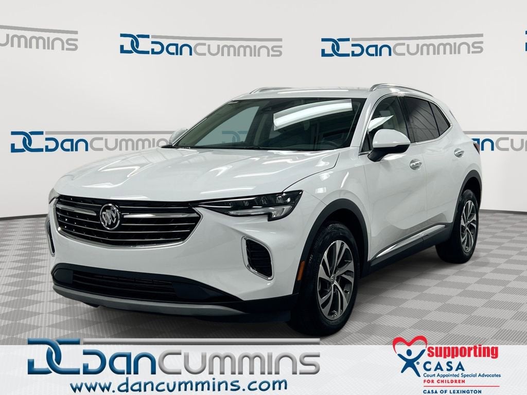 2023 Buick Envision Essence in Summit White — front three-quarter view