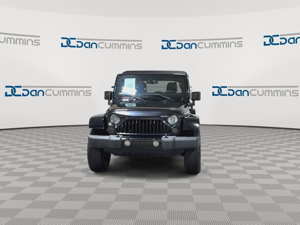 2016 Jeep Wrangler Unlimited — rear three-quarter view