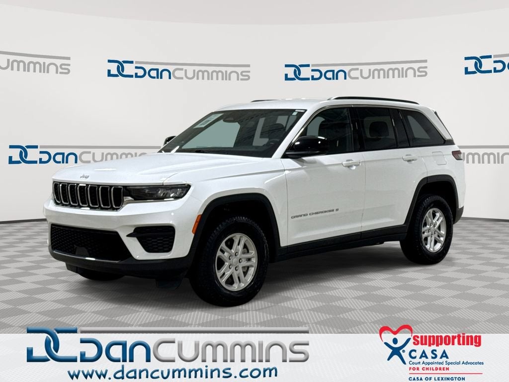 2024 Jeep Grand Cherokee Laredo in White — front three-quarter view