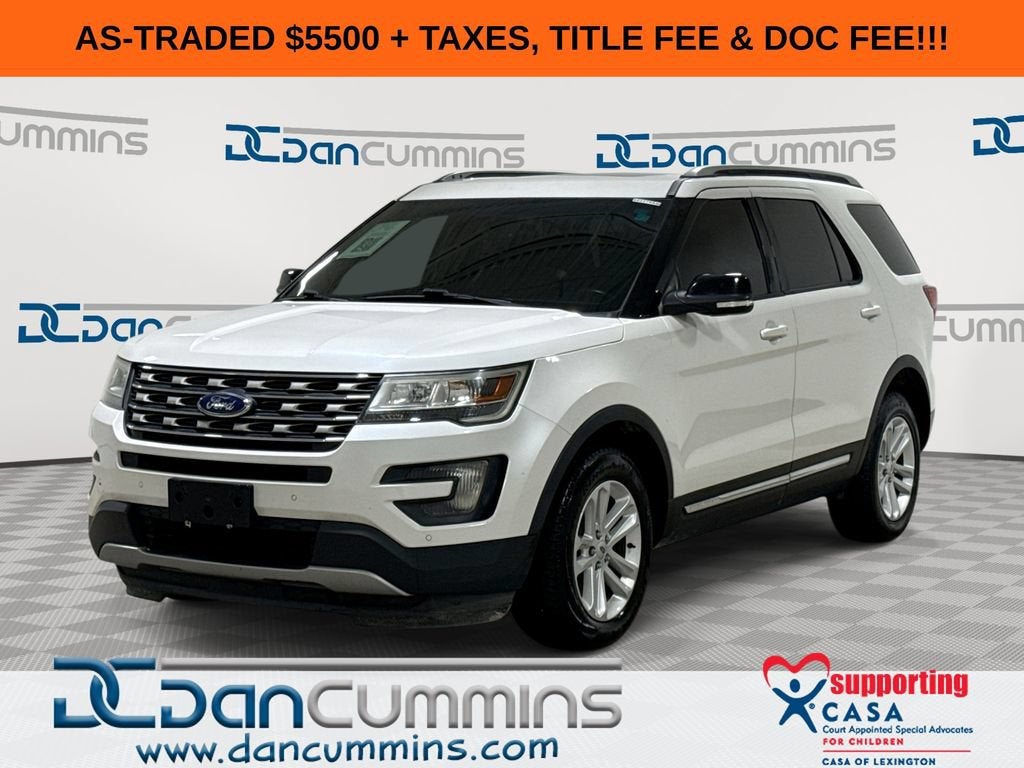 2016 Ford Explorer XLT in White — front three-quarter view