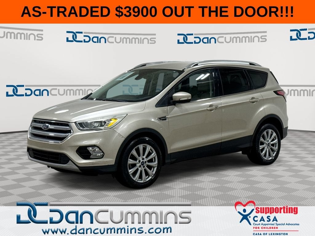 2017 Ford Escape Titanium in Tan — front three-quarter view
