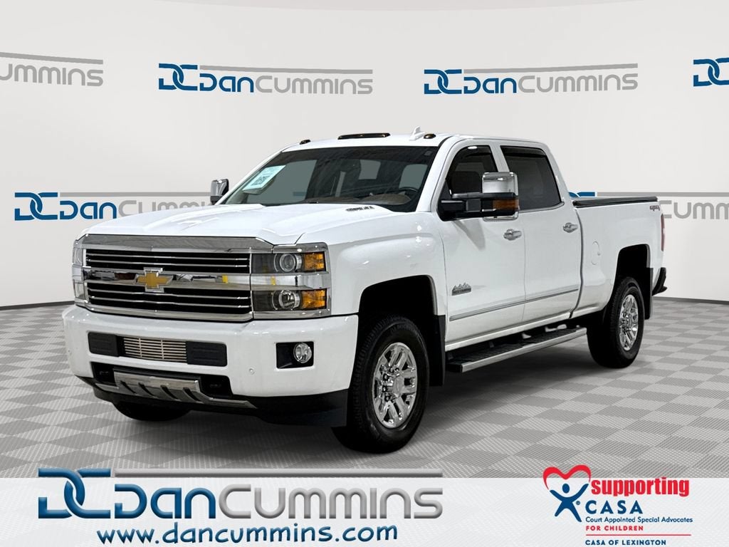 2015 Chevrolet Silverado 3500 HD High Country in Summit White — front three-quarter view