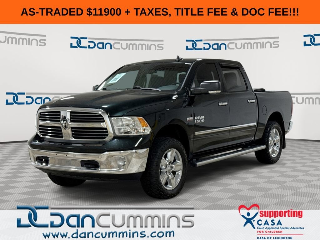 2016 RAM 1500 Big Horn in Black — front three-quarter view