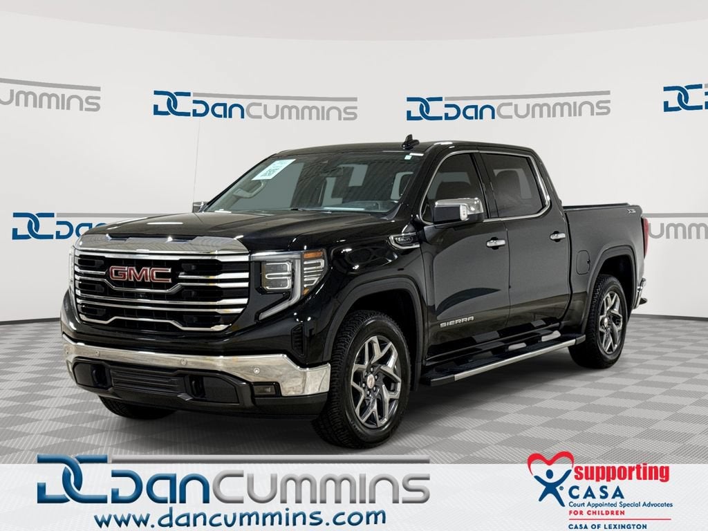 2022 GMC Sierra 1500 SLT in Onyx Black — front three-quarter view