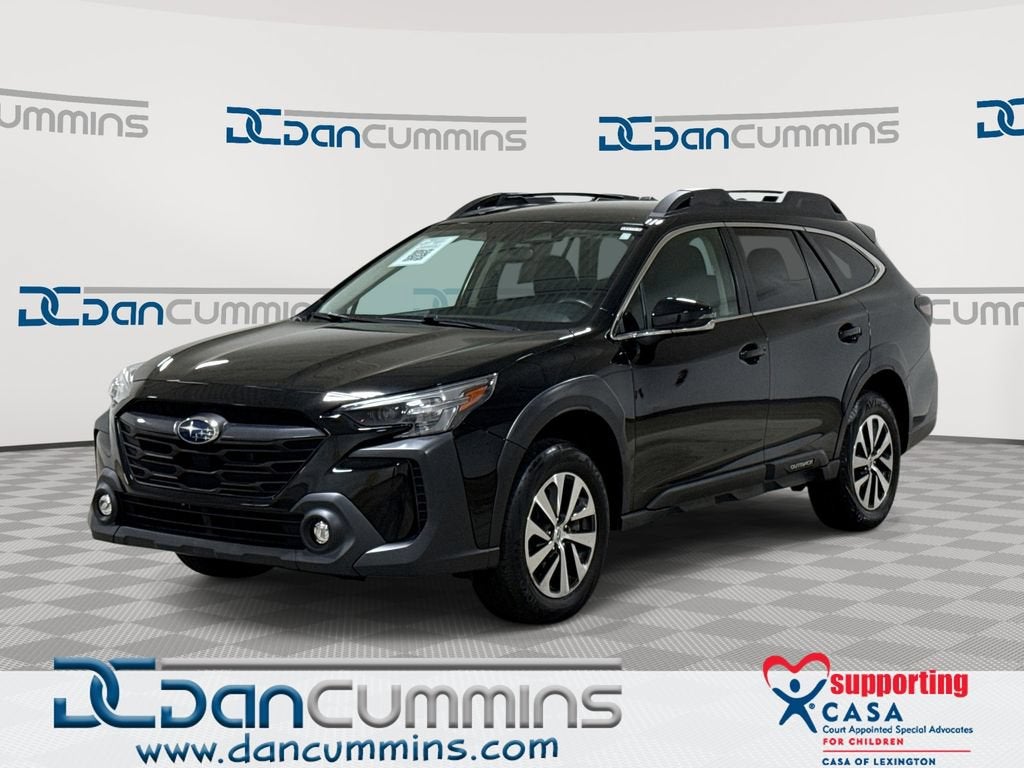 2023 Subaru Outback Premium in Black — front three-quarter view
