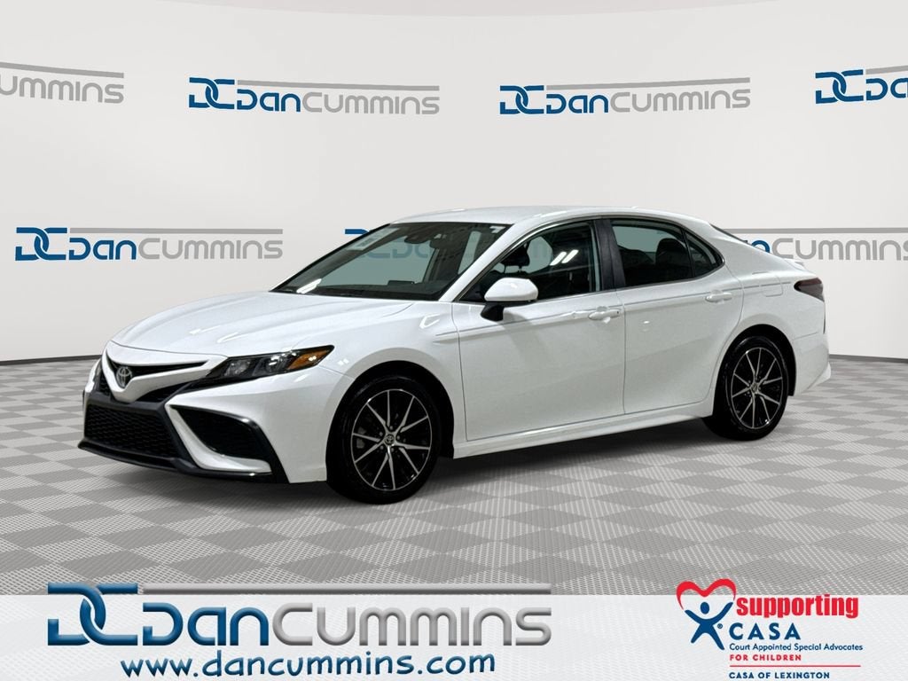2021 Toyota Camry SE Nightshade in White — front three-quarter view