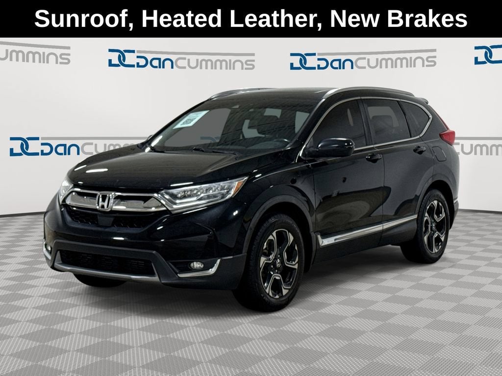 2017 Honda CR-V Touring in Black — front three-quarter view