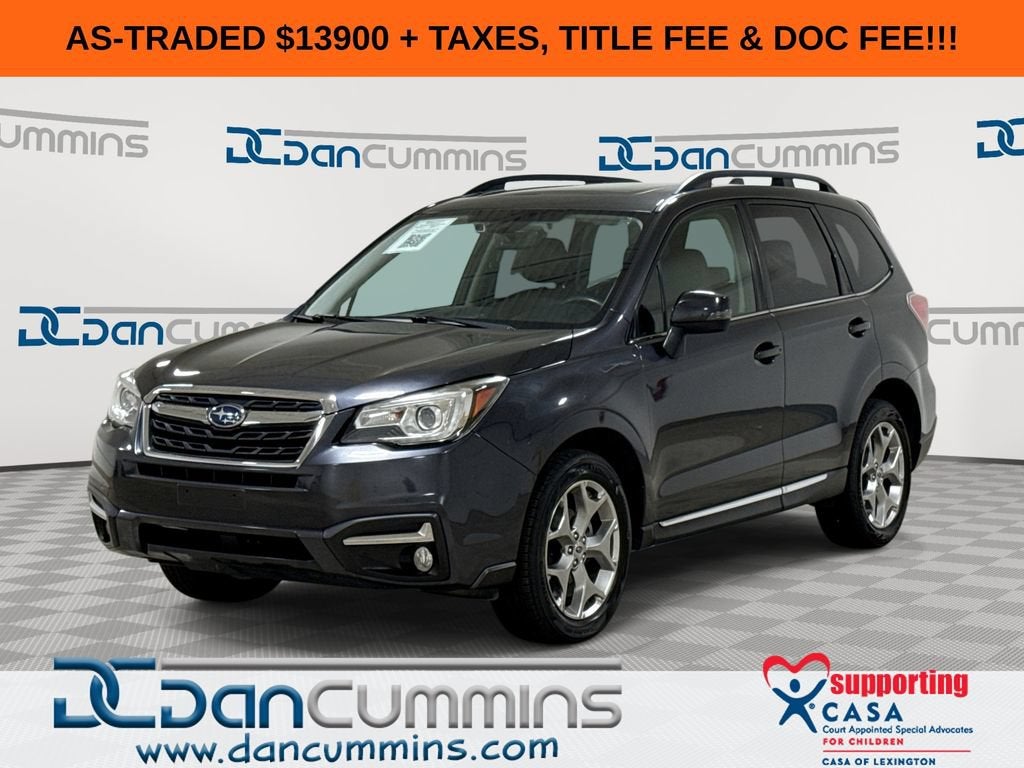 2018 Subaru Forester Touring in Black — front three-quarter view