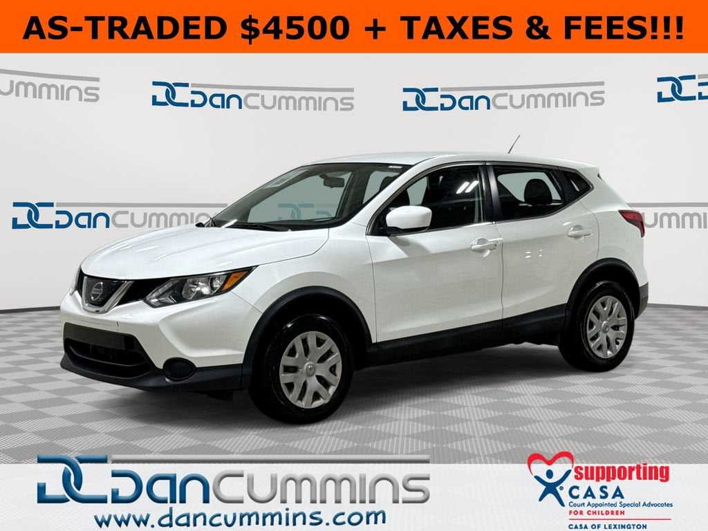 2019 Nissan Rogue Sport S in White — front three-quarter view